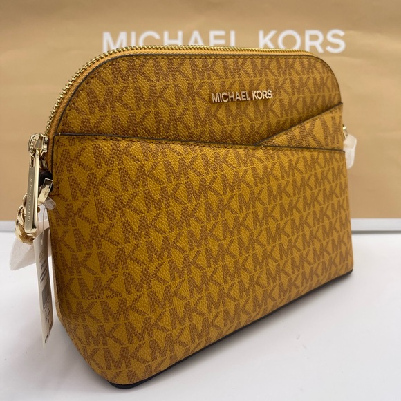 Michael Kors Handbags - Michael Kors Jet Set Travel Md Logo Dome Crossbody XCROSS XBODY
Marigold
NWT